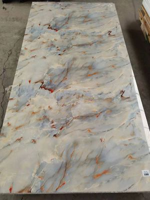 Panneau mural en PVC hautement brillant imperméable à l'eau Finition en marbre UV en pierre artificielle pour le ménage